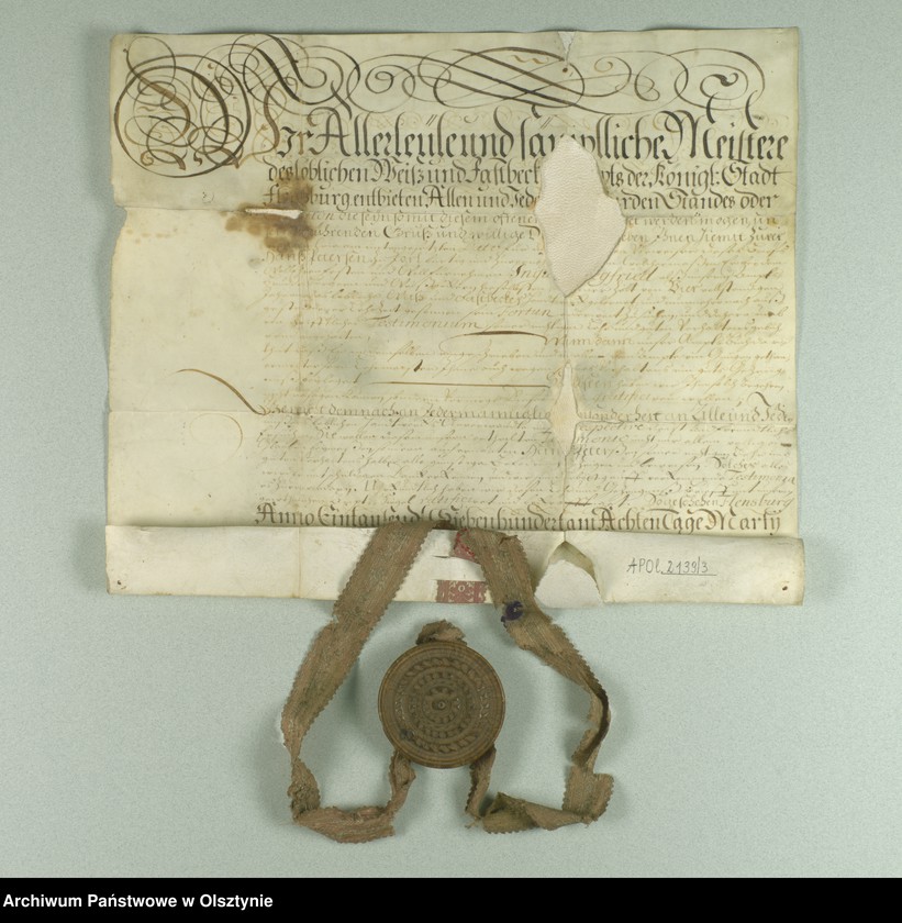 image.from.unit "Lehr-und Zeugnis-Brief des Bäcker-Gewerk in Flensburg für den Hans Petersen zu Jorl geburtig. /Urkunde auf Pergament/"