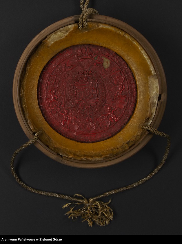 image.from.unit.number "Rudolf II cesarz ustanawia nowy herb dla miasta Żagania, określa jego barwy, nadaje również nową pieczęć i zezwala na używanie przez władze czerwonego wosku."